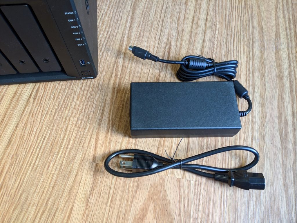 The Synology DS1019+ is compact but uses a relatively large power adapter.