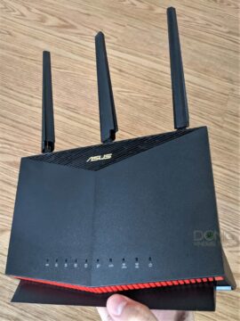 How to pick the best Wi-Fi router: The ASUS RT-AX86U Hand sure is one right Wi-Fi choice.