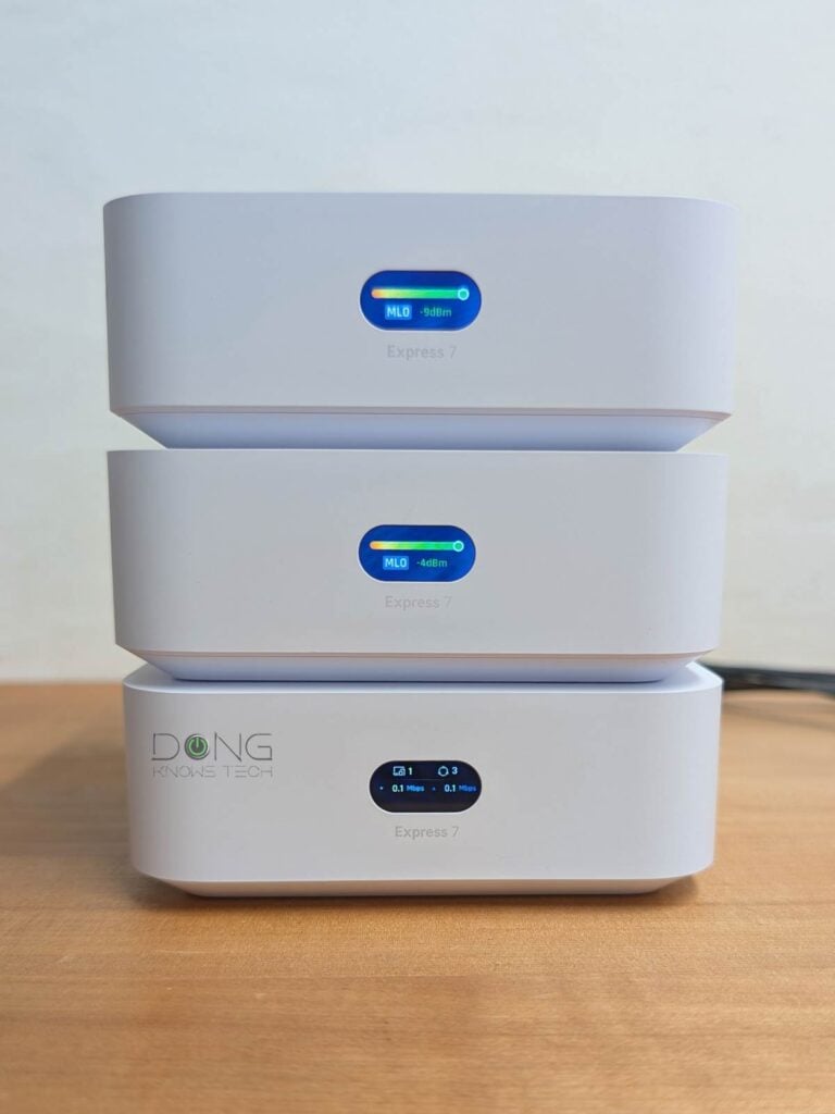 A 3 pack (UX7 3) of Ubiquiti's UniFi Home Wi-Fi 7 mesh system, part of its Whole Home WiFi category, featuring three UniFi Express 7 units in action. Note the MLO backhaul link