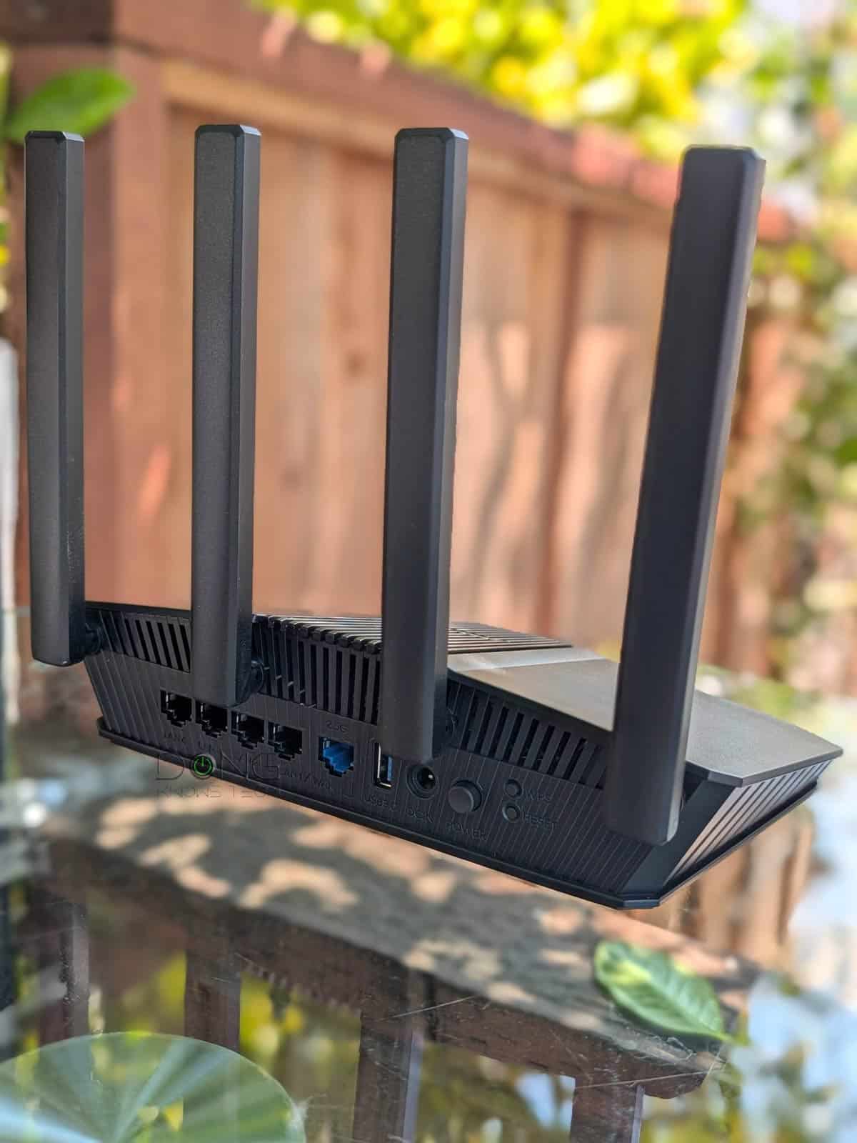 ASUS RT-BE58U Review (vs. NETGEAR Nighthawk S100): Wi-Fi 7 for Those with Modest Bandwidth Needs 6 ASUS RT BE58U Port Side