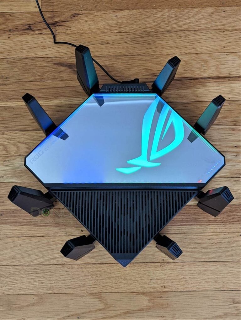 The ASUS GT-AXE16000 can produce quite a light show when its programmable ROG Aura is lit up.
