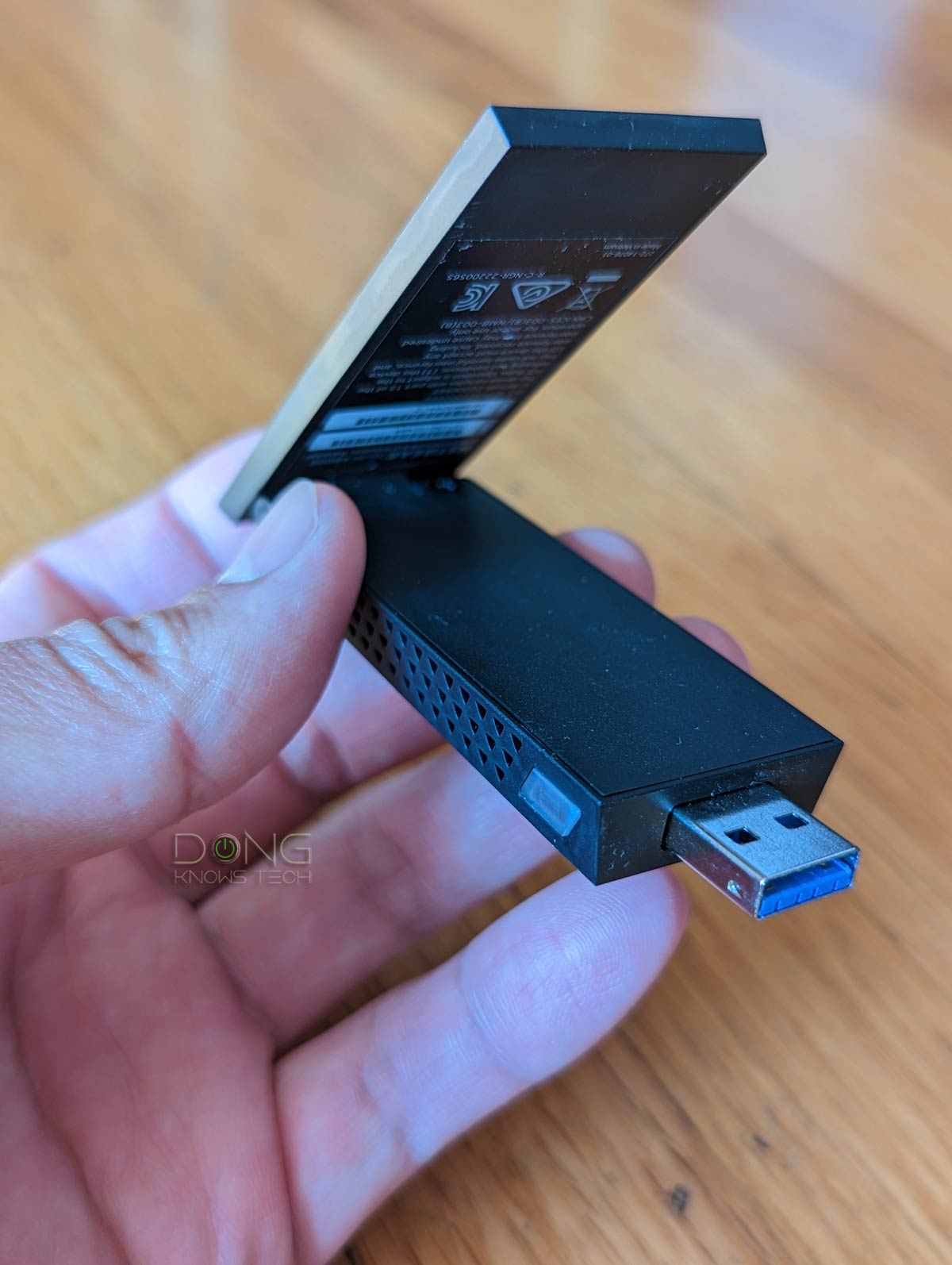 NETGEAR A8000 Wi-Fi 6E Adapter Hand
