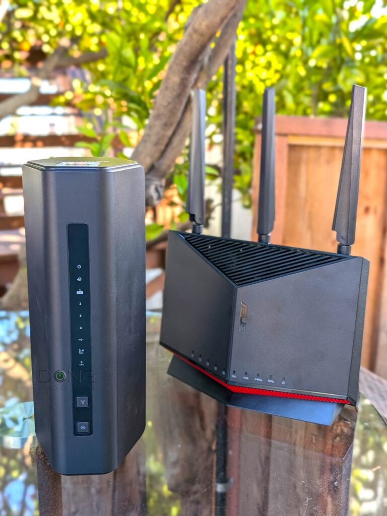 NETGEAR Nighthawk RS200 vs. ASUS RT-BE86U front