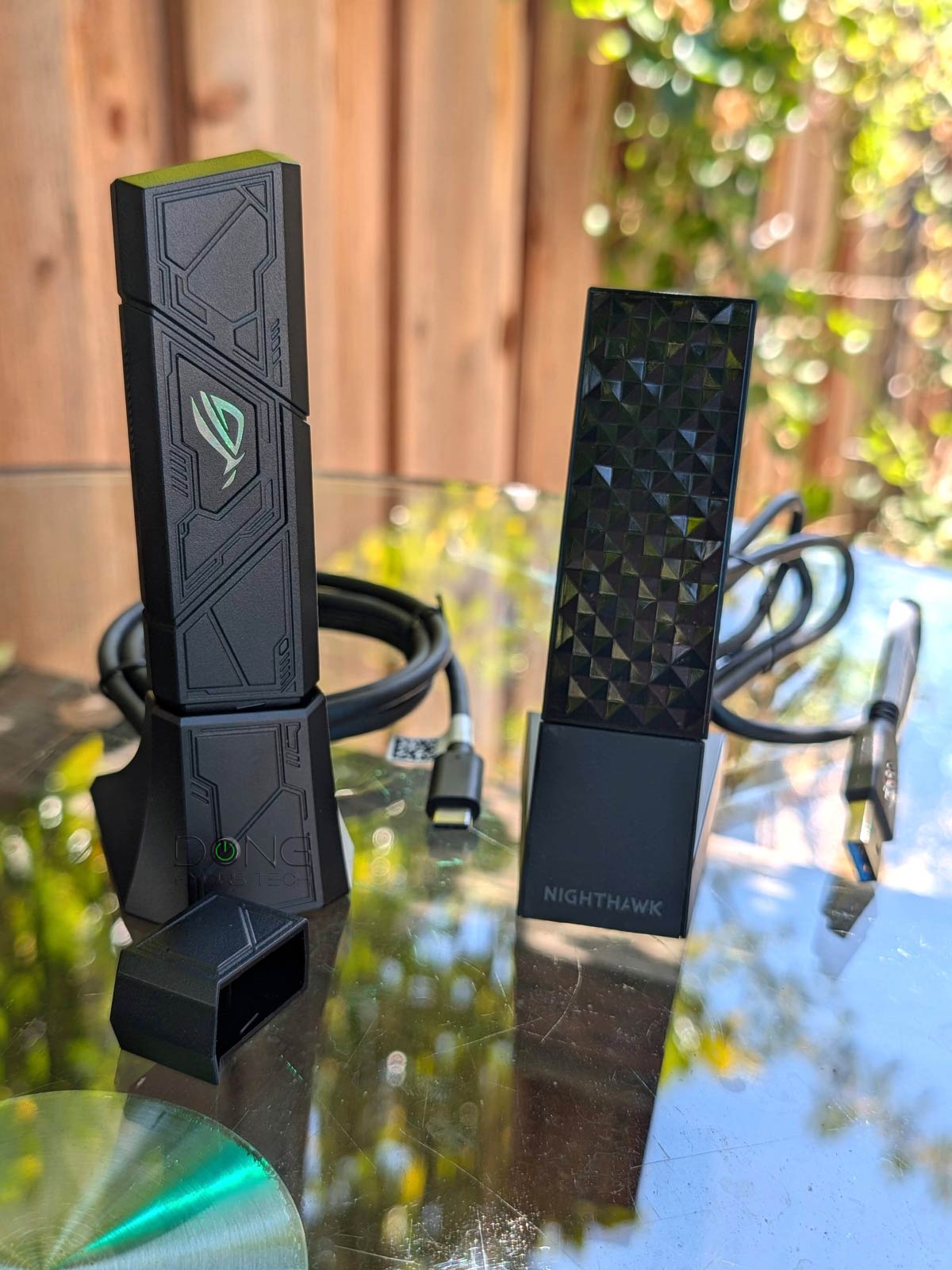 ASUS ROG USB-BE92 Review (vs. NETGEAR Nighthawk A9000): A Flexible and Effective Wi-Fi 7 Upgrade 13 The ASUS ROG USB BE92 vs. NETGEAR Nighthawk A9000 with USB base