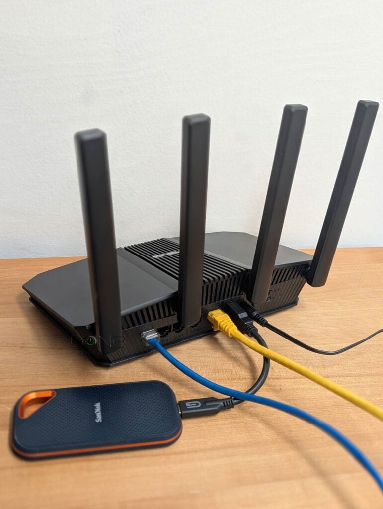 ASUS RT-BE58U Review (vs. NETGEAR Nighthawk S100): Wi-Fi 7 for Those with Modest Bandwidth Needs 13 The ASUS RT BE58U being tested