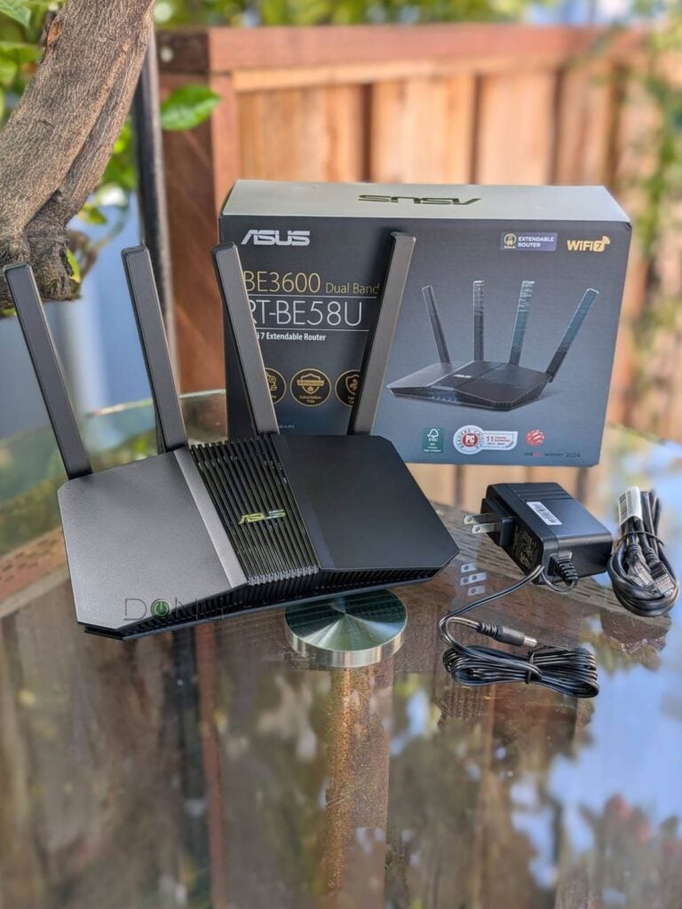 ASUS RT-BE58U Review (vs. NETGEAR Nighthawk S100): Wi-Fi 7 for Those with Modest Bandwidth Needs 1 The ASUS RT BE58U router and its retail box