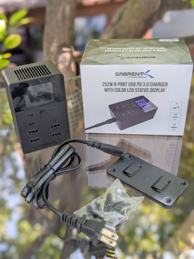 The Sabrent Voltik 252W 8 PORT USB PD 3.0 Charger (model AX 8PTC) comes with mounting accessories and a standard two prong power cable out of the box