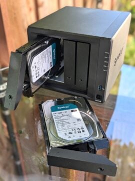 The Synology DS925+ NAS server and two Synology branded hard drives