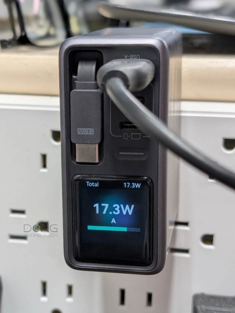 The screen of the UGREEN X776 Nexode Pro 160W Charger with Retractable Cable automatically rotates to orient itself depending on how the charger is plugged into power